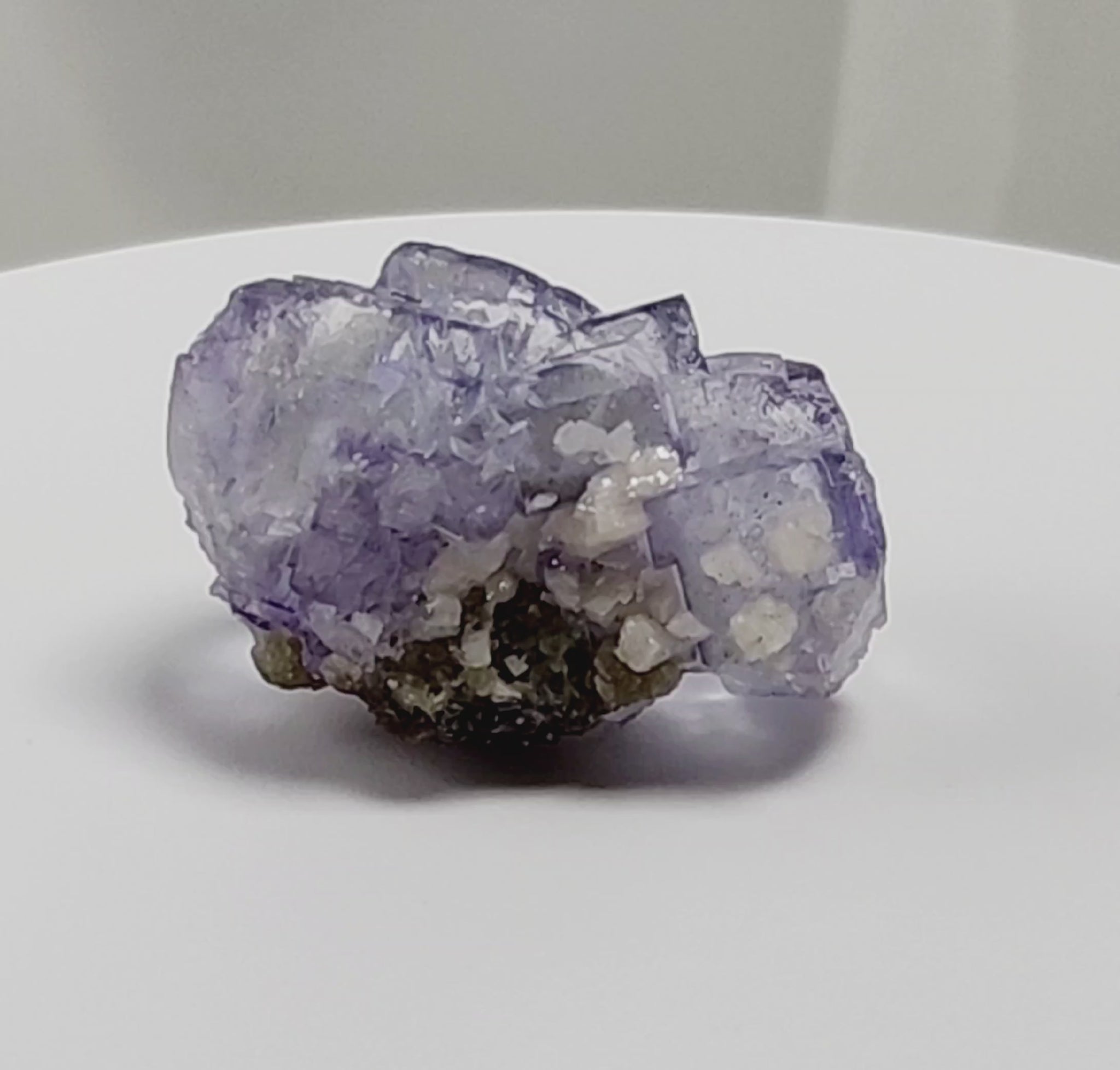Yaogangxian  fluorite is cherished for its exceptional quality and crisp beauty with stunning water-like cubic crystals and purple-blue phantoms that create a mesmerizing effect.  www.4crones.com