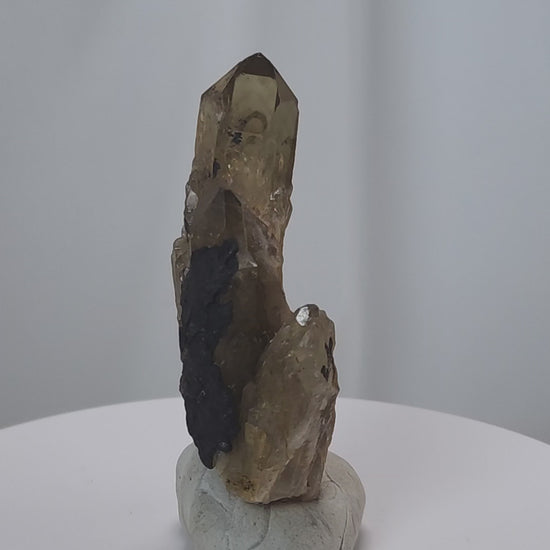 Kundalini Citrine Quartz is a stunning and rare variety of Citrine found exclusively in the Democratic Republic of Congo. This Natural Citrine is also characterized by a distinct formation of multiple terminated smaller Kundalini Quartz crystals.
