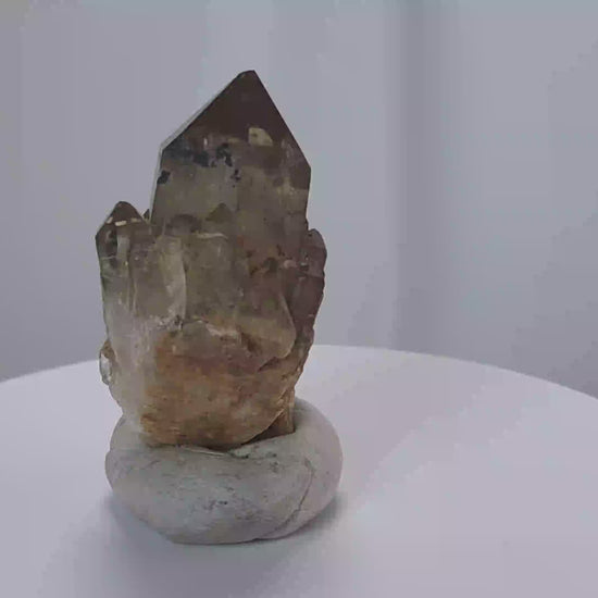 Kundalini Citrine Quartz is a stunning and rare variety of Citrine found exclusively in the Democratic Republic of Congo. This Natural Citrine is also characterized by a distinct formation of multiple terminated smaller Kundalini Quartz crystals.