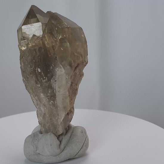 Kundalini Citrine Quartz is a stunning and rare variety of Citrine found exclusively in the Democratic Republic of Congo. This Natural Citrine is also characterized by a distinct formation of multiple terminated smaller Kundalini Quartz crystals.