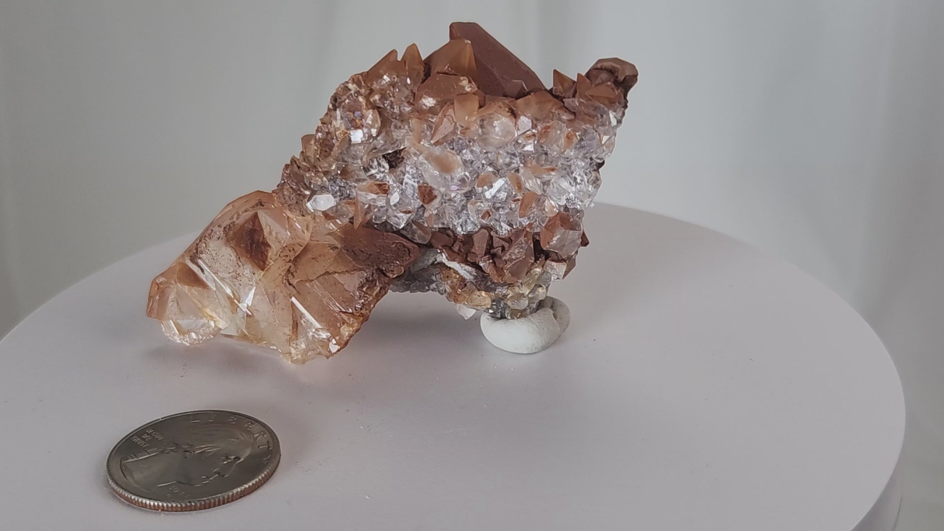 Red Diamond Calcite, glassy, gemmy diamond shaped geometries otherwise known as rhombohedrons and or scalenohedrons are combined with iron oxide hematoid inclusions. www.4crones.com